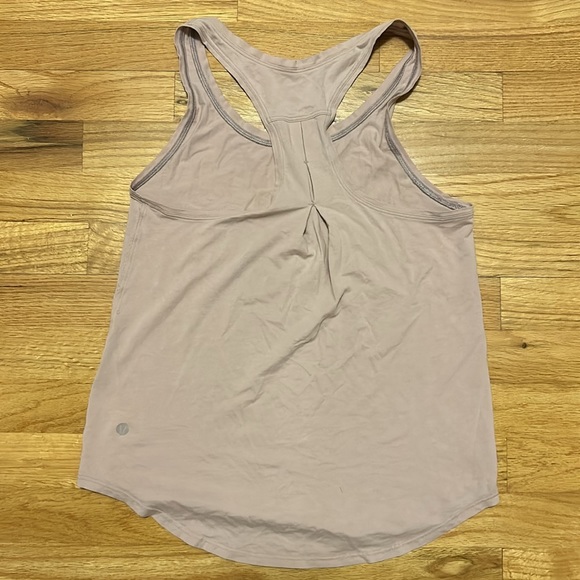 Lululemon tank fits 4/6 light lavender very soft good condition. - Picture 2 of 2